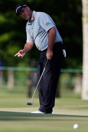 Boo Weekley makes a putt on the 14th hole during the second round of the Zurich Classic of New Orleans on April 26, 2013